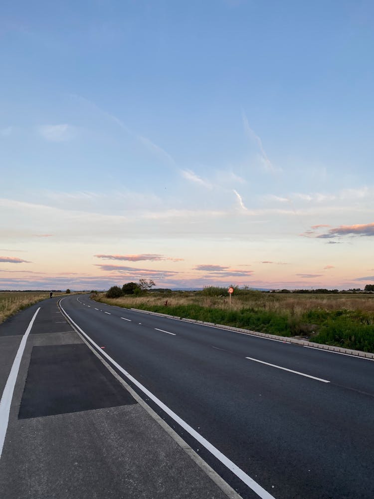 An Empty Road On A Sunset