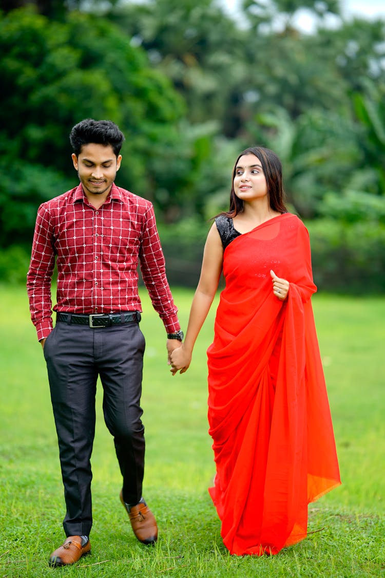 Couple On Stroll In Park