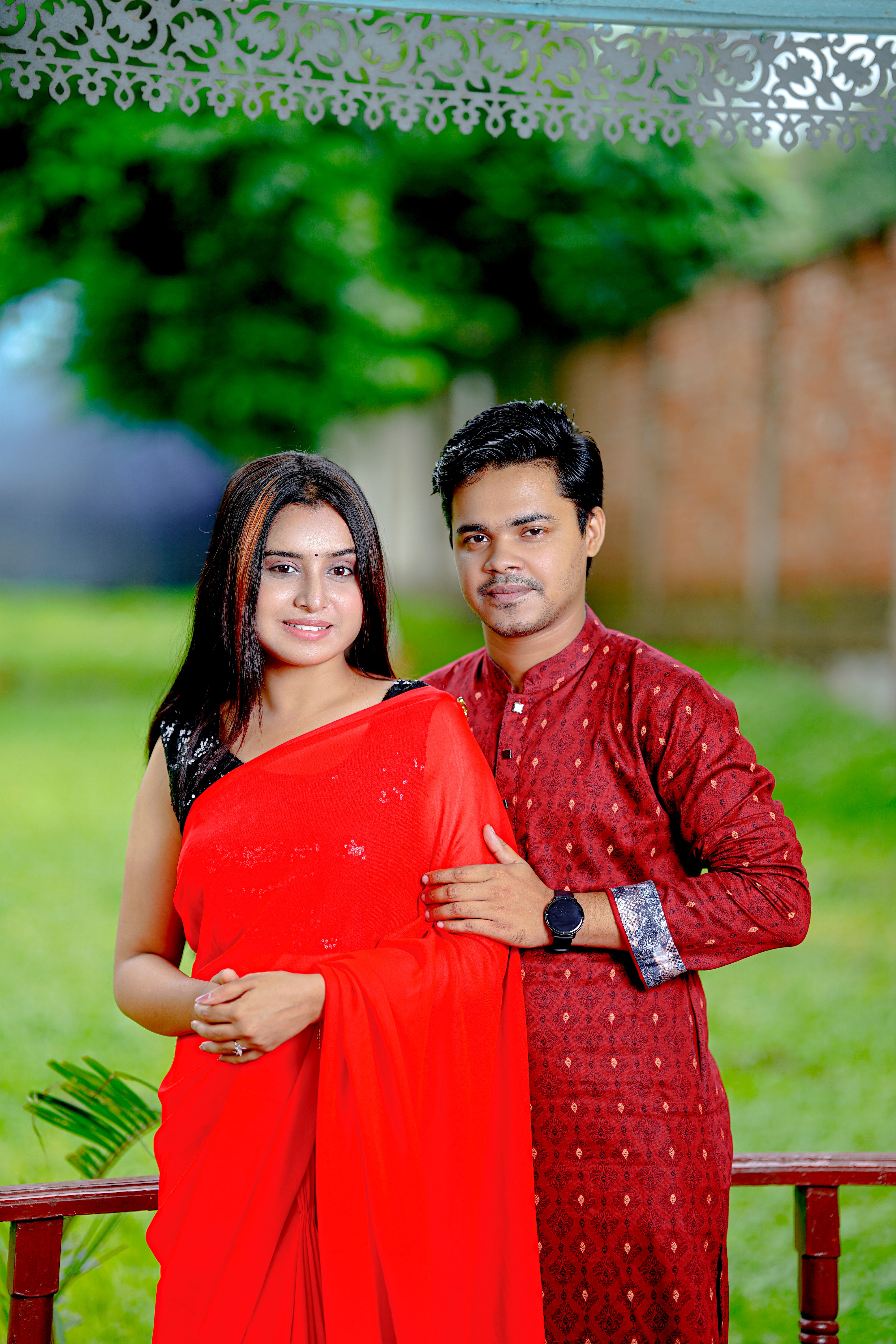 Smiling Couple Posing in Traditional Indian Clothes · Free Stock Photo