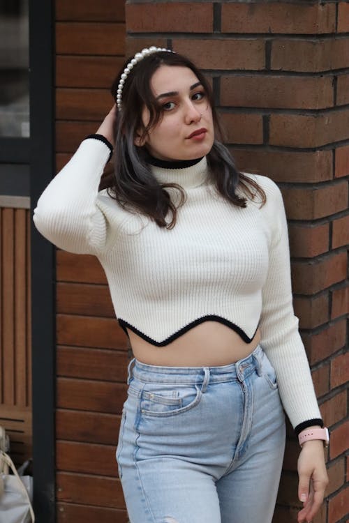 A Brunette in a White Sweater