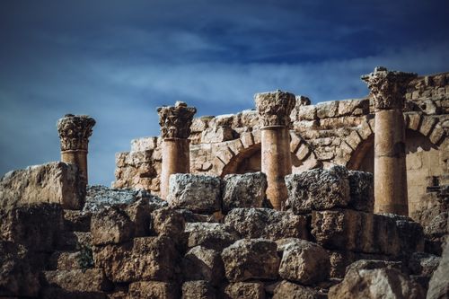 Free Stunning view of ancient Roman ruins and columns in Jerash, Jordan, under a clear blue sky. Stock Photo