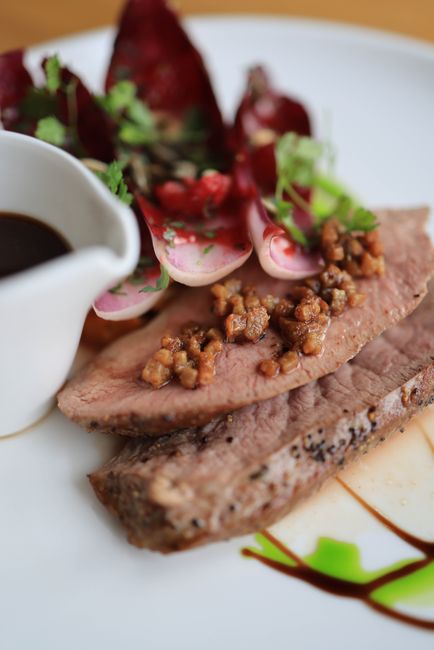 Halved radishes roasted until tender and lightly caramelized, tossed with butter and herbs.
