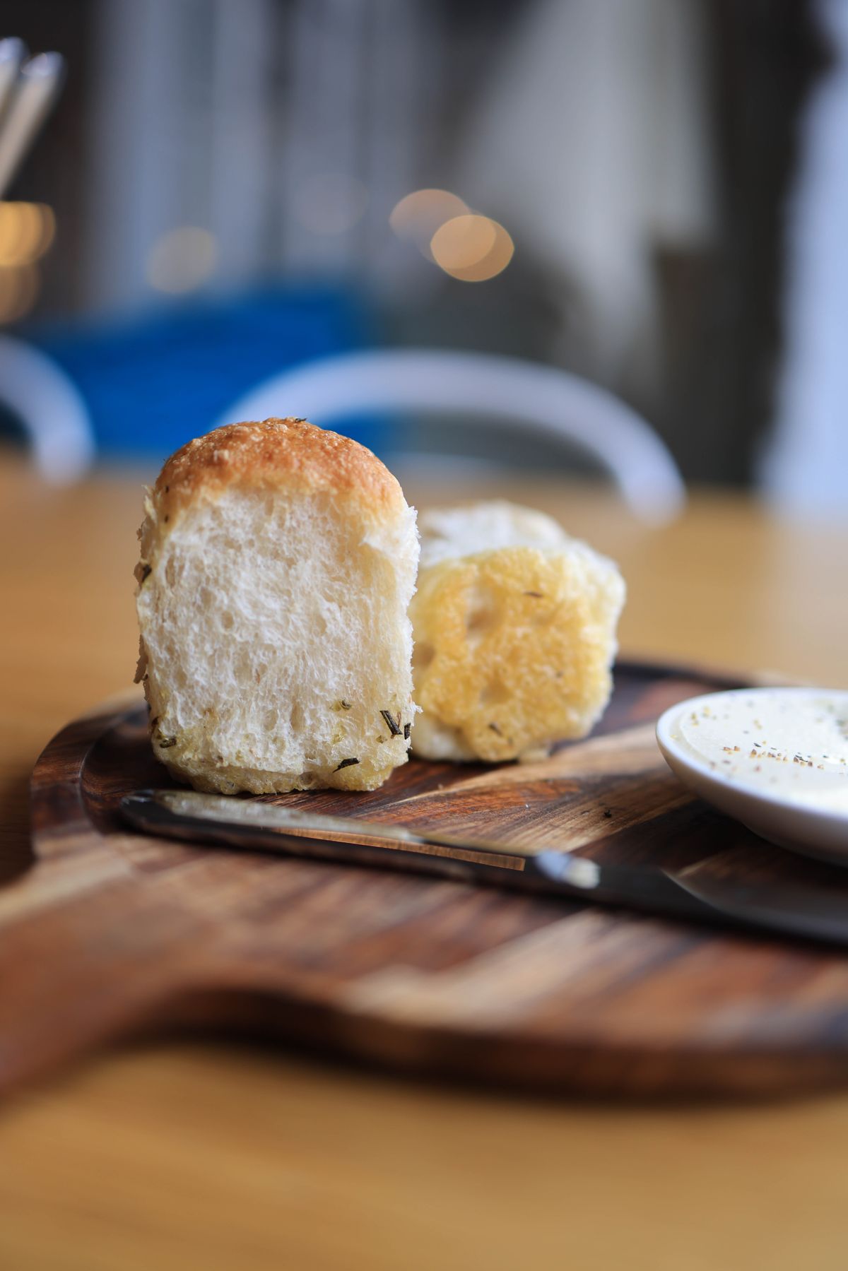 Thick toasted brioche slices on a wooden board showing a soft crumb