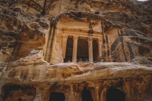 Free Explore the timeless beauty of Petra's rock-carved architecture in Jordan, a UNESCO World Heritage Site. Stock Photo