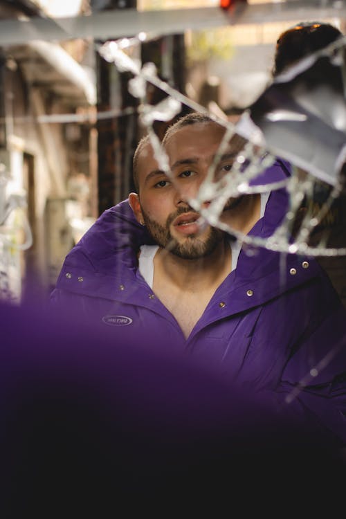 Man in front of a Broken Mirror 