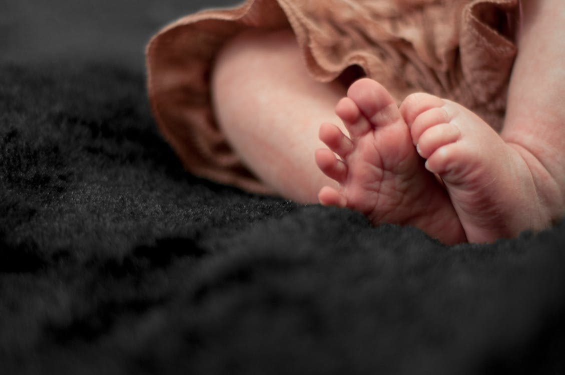 Free Baby Wearing Brown Pant Stock Photo