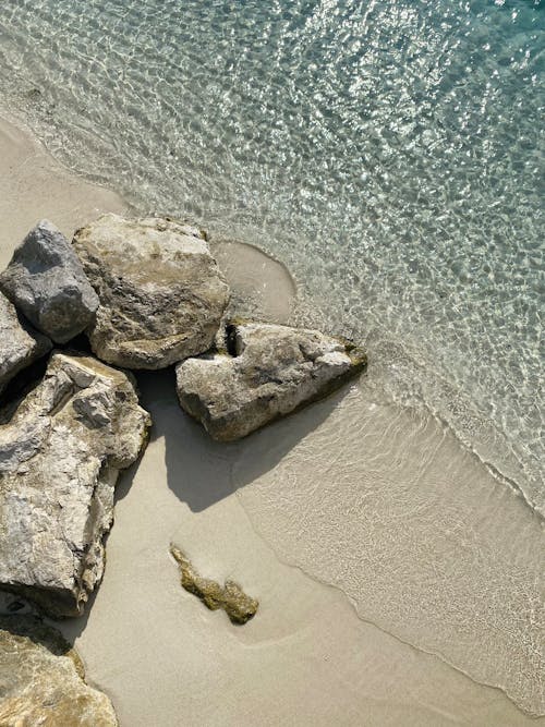 Darmowe zdjęcie z galerii z morze, piasek, pionowy strzał