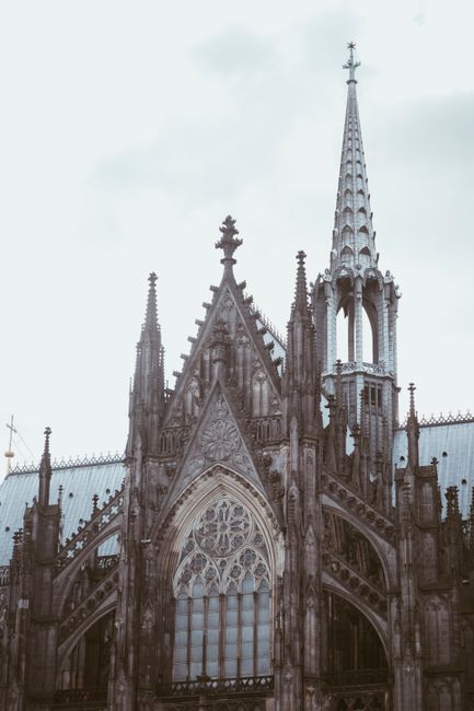 Detailed view of the Gothic spires and intricate designs of Cologne Cathedral, a UNESCO World Heritage Site.