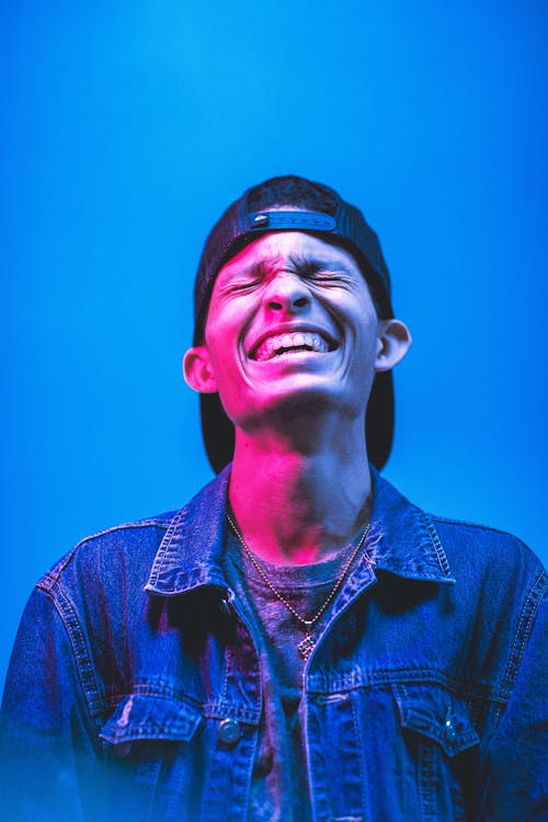 Photo of Man Wearing Denim Jacket