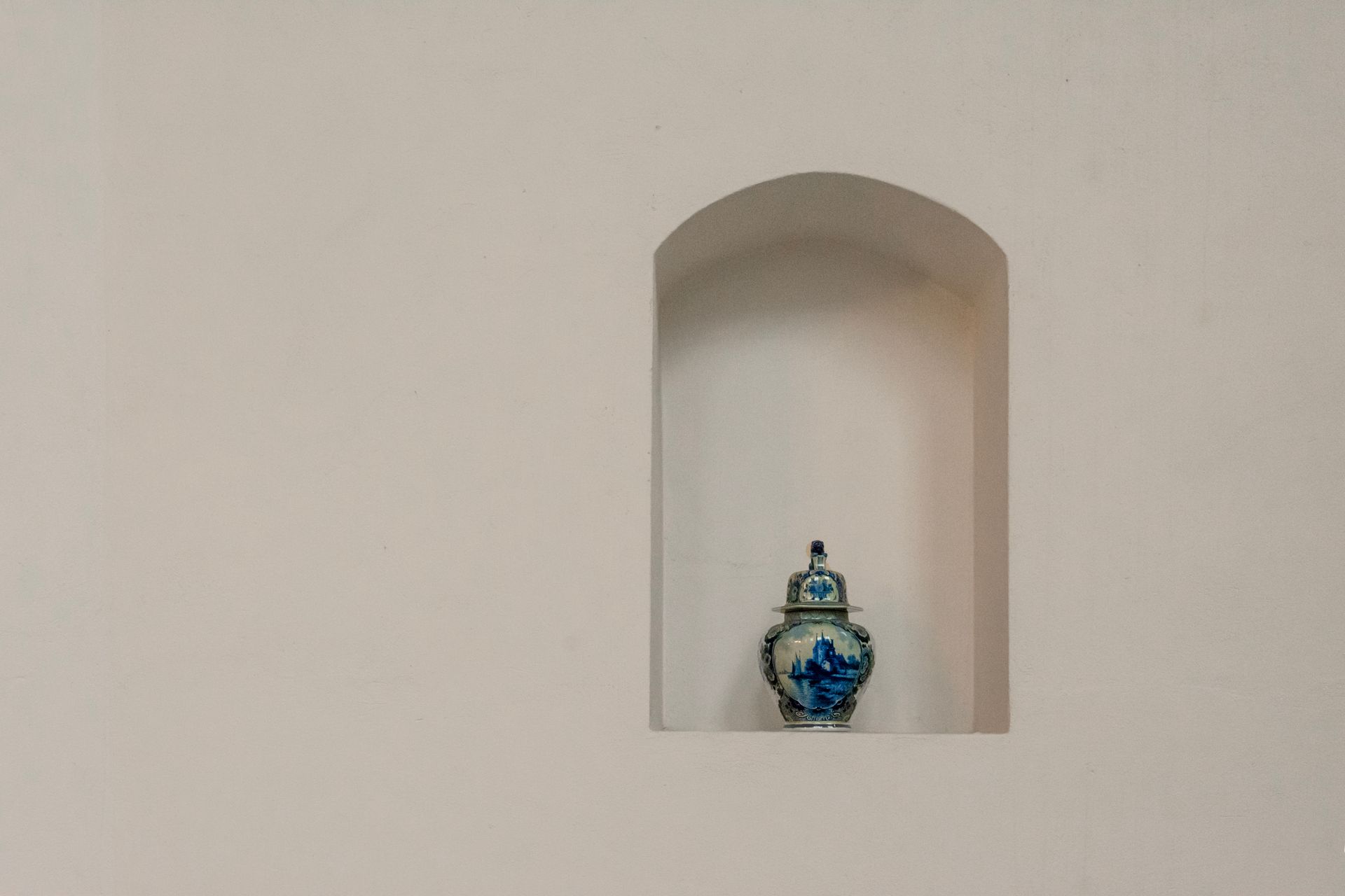 White Wall Niche with a Vase