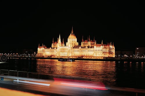 Orszaghaz behind Danube at Night