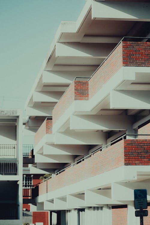 A building with balconies and balconies on the side