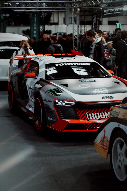 Free Powerful racing car showcased at Budapest motorsport event with vibrant design and sleek lines. Stock Photo