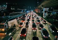 Photo of Vehicles On Road During Evening