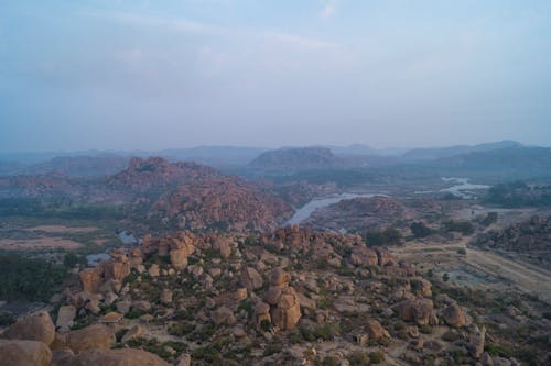 Overlooking View of Brown Rocks and Green Plants