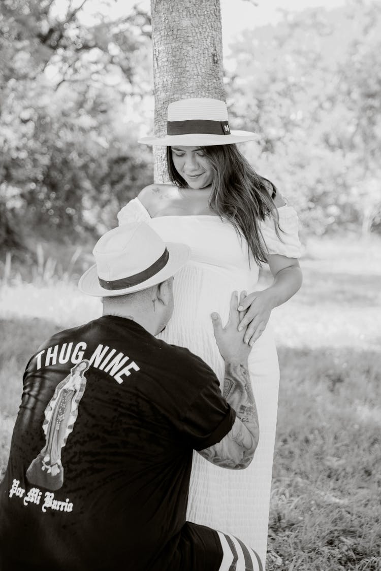 Man Kissing Pregnant Woman Stomach