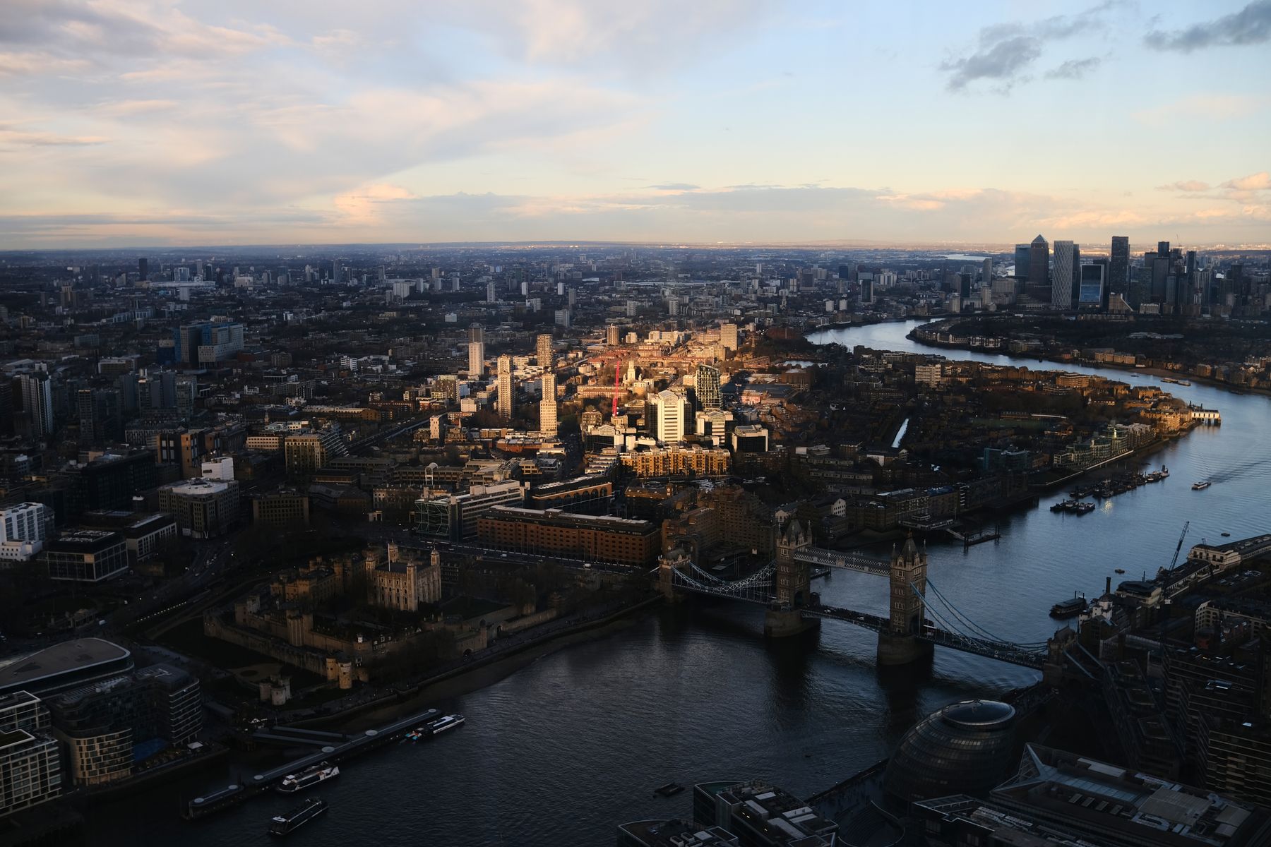 Tower Bridge and London skyline at sunset