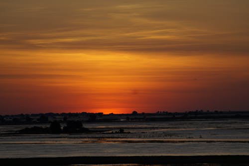Orange Sunset Sky over a Marsh 
