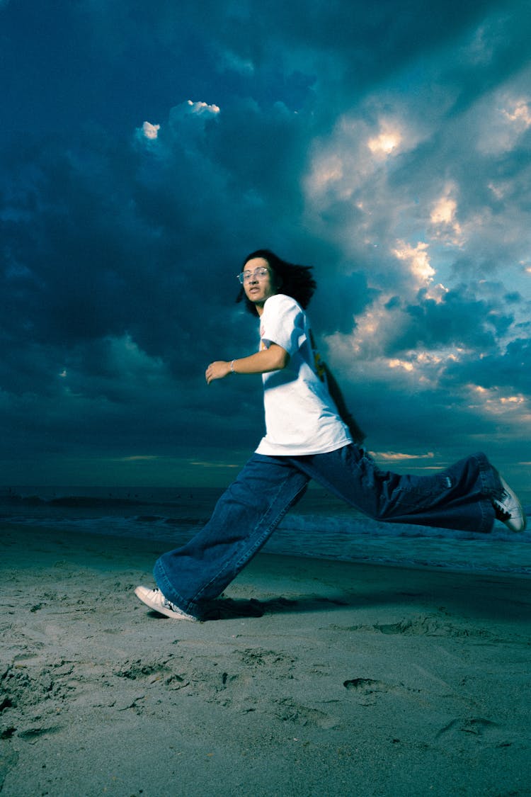 Man Running In Oversized Pants