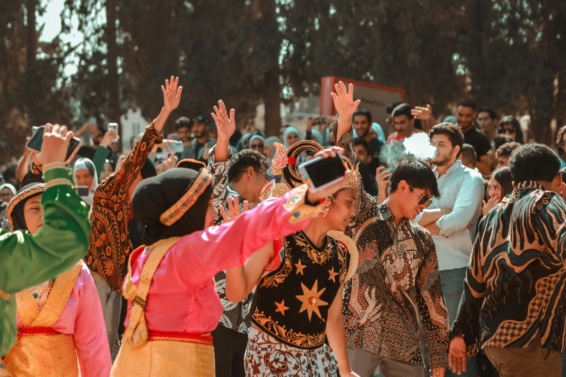 Vibrant cultural dance festival in Amman, Jordan showcasing traditional clothing and joyful expressions.