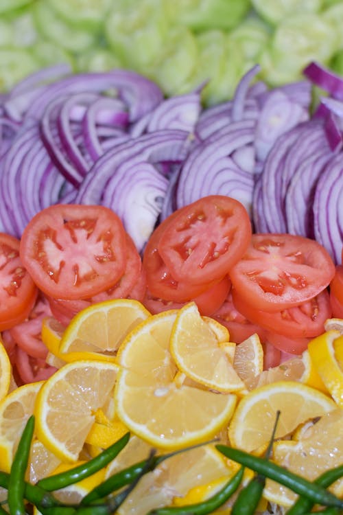 Cut Fresh Fruits and Vegetables in Row