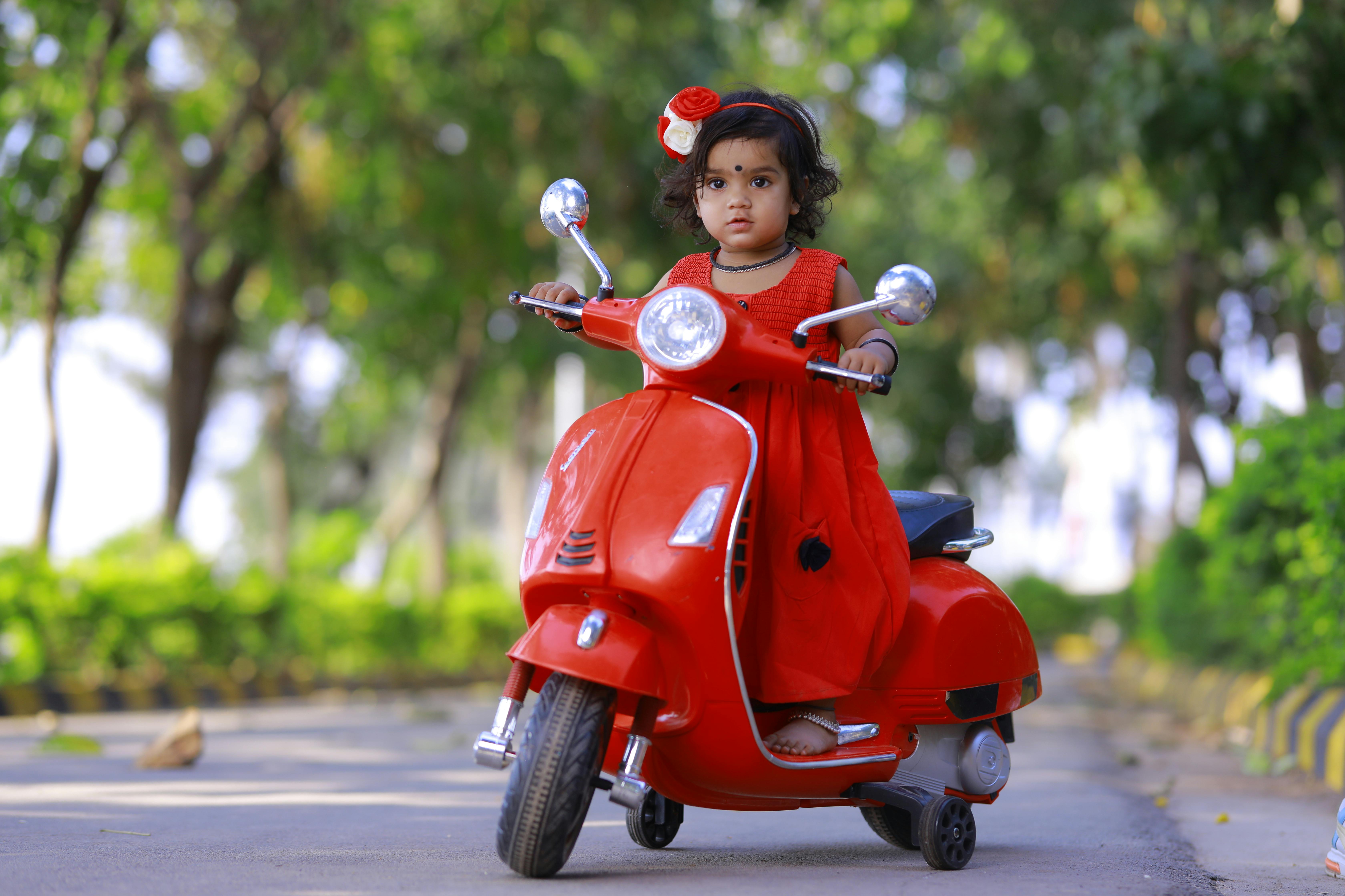 Girl on Scooter · Free Stock Photo