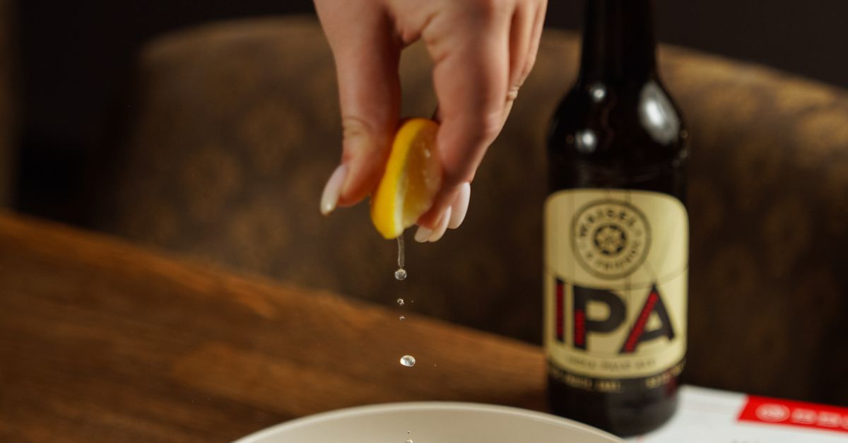 Lemon Adding Adding Lemon to Fish · Free Stock Photo