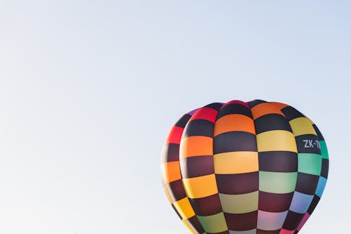 Colorful Hot Air Balloon against Blue Sky