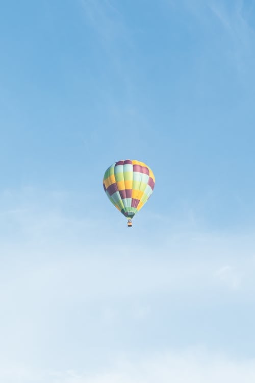 Checkered Hot Air Balloon on Blue Sky