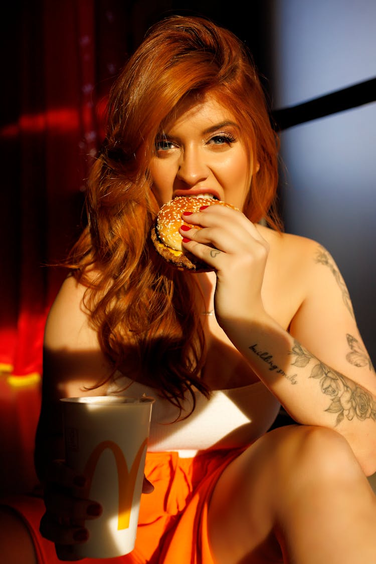 Woman Eating Burger