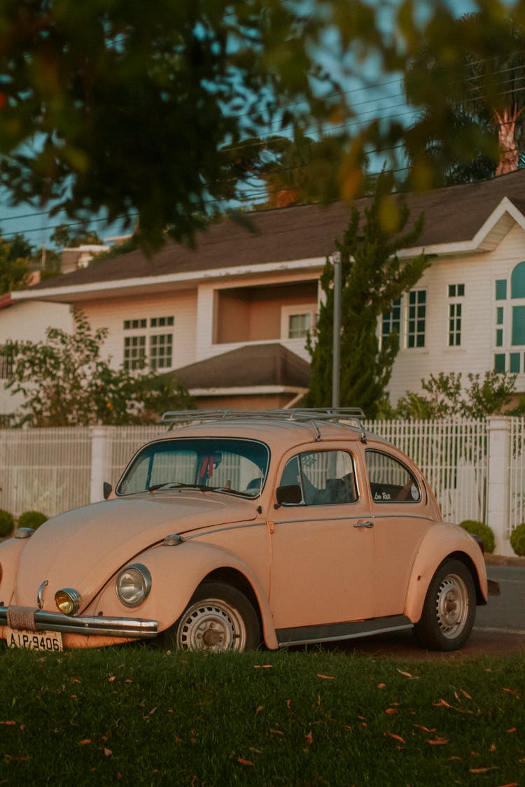 Classic Car Parked In Front Of House