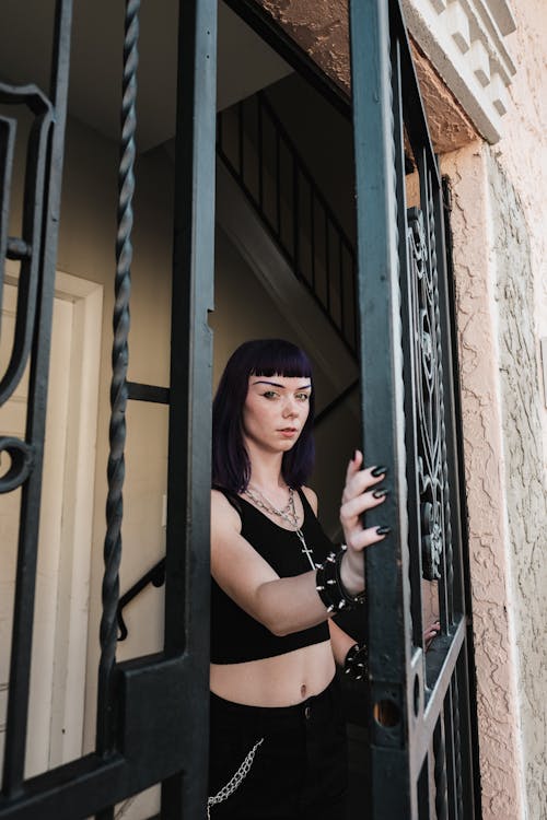 Punk Girl Opening House Gates