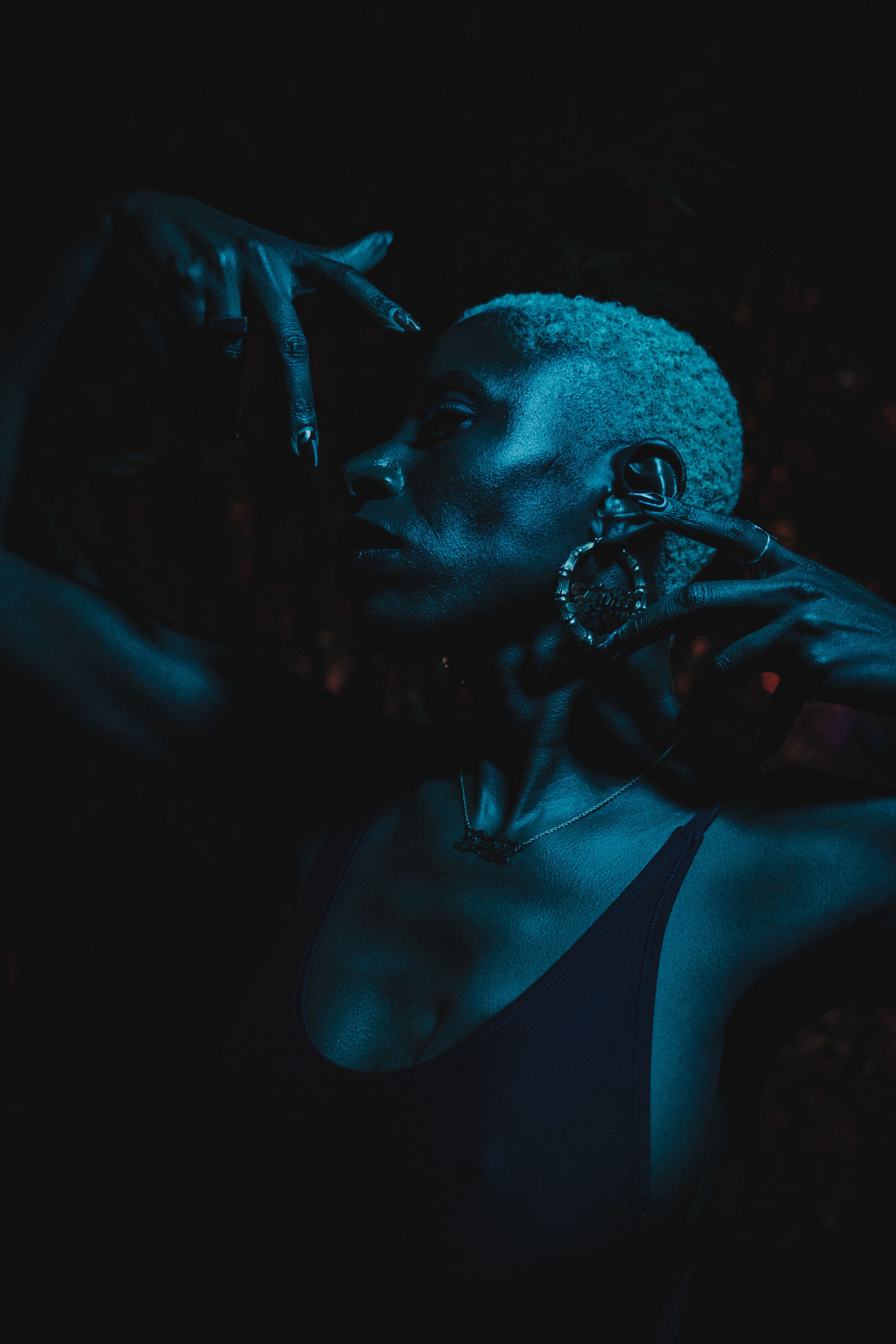 Woman with Short Hair Posing in Darkness · Free Stock Photo