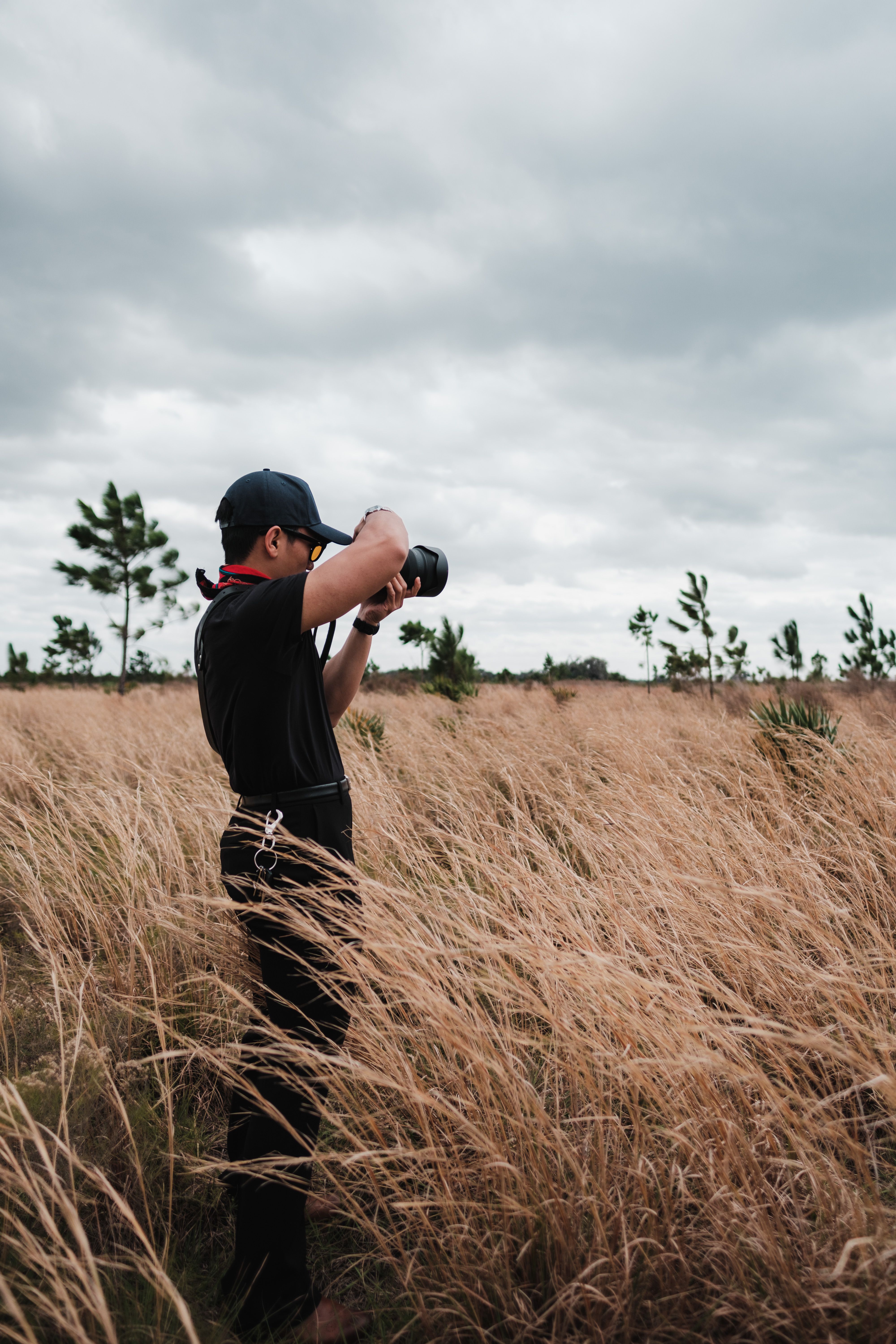 Man with Camera on Field · Free Stock Photo