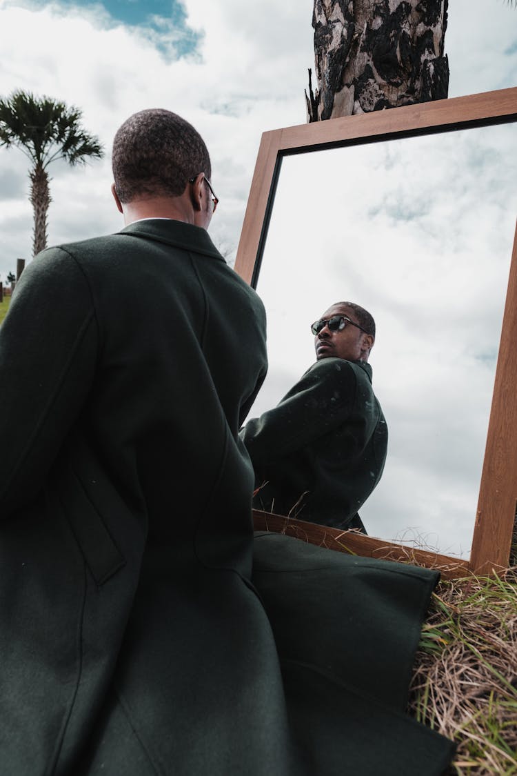 Man Posing In Mirror