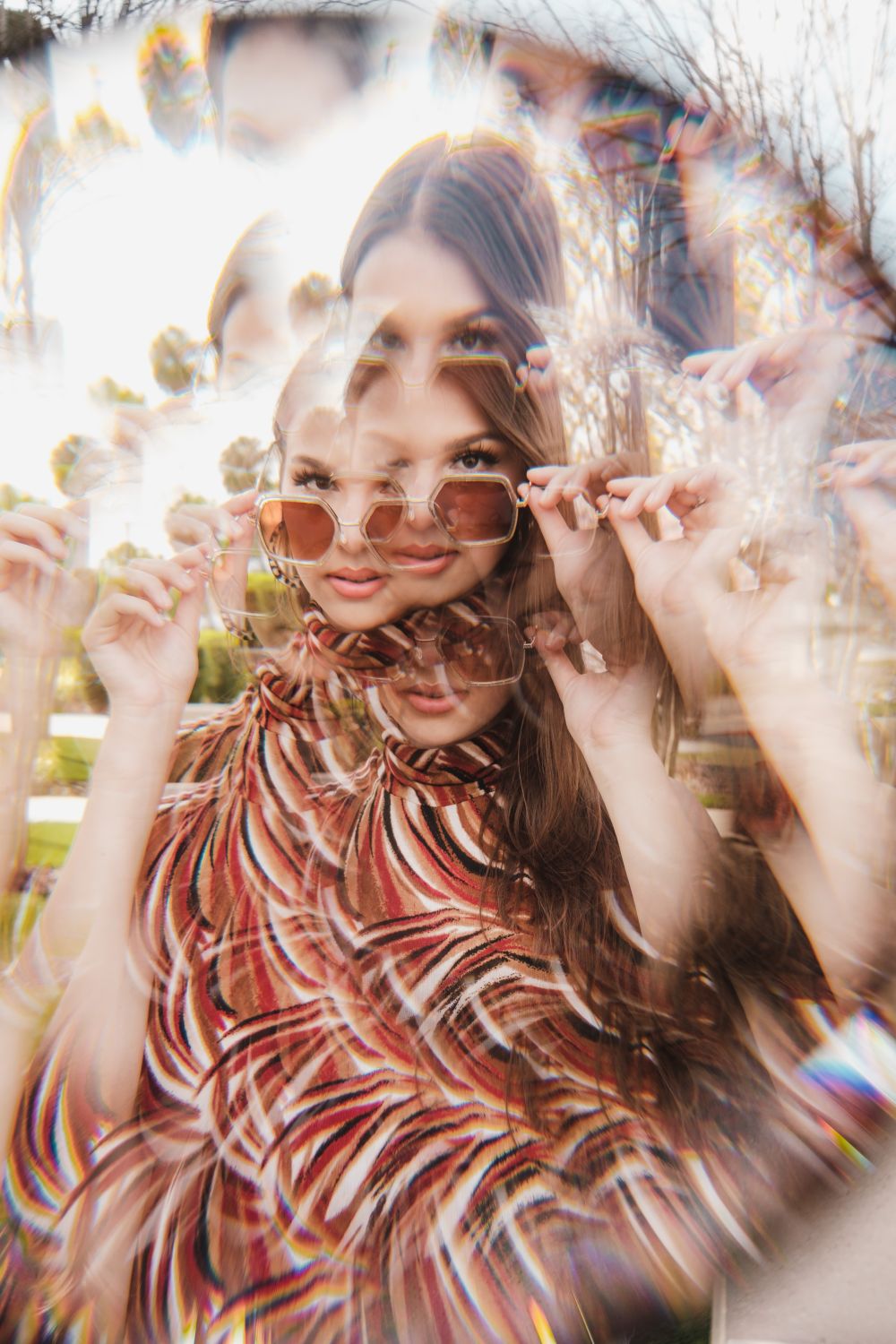 Blurred Woman Posing with Sunglasses · Free Stock Photo