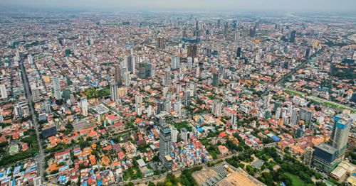 Free Stunning aerial view of Phnom Penh showcasing its bustling urban landscape and skyline. Stock Photo