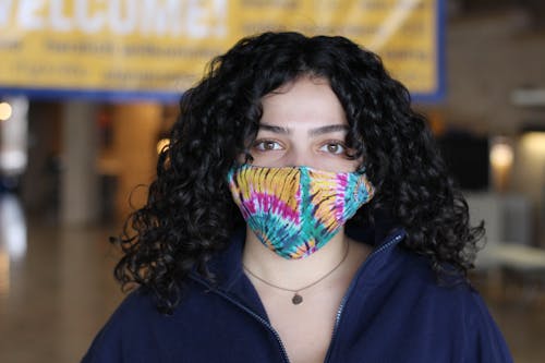 Woman Posing in Mask