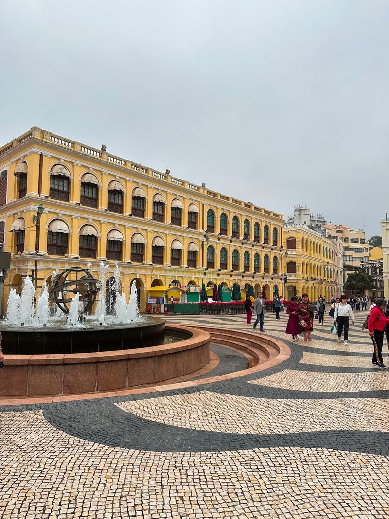 Senado Square in Macao with fountain and colonial buildings