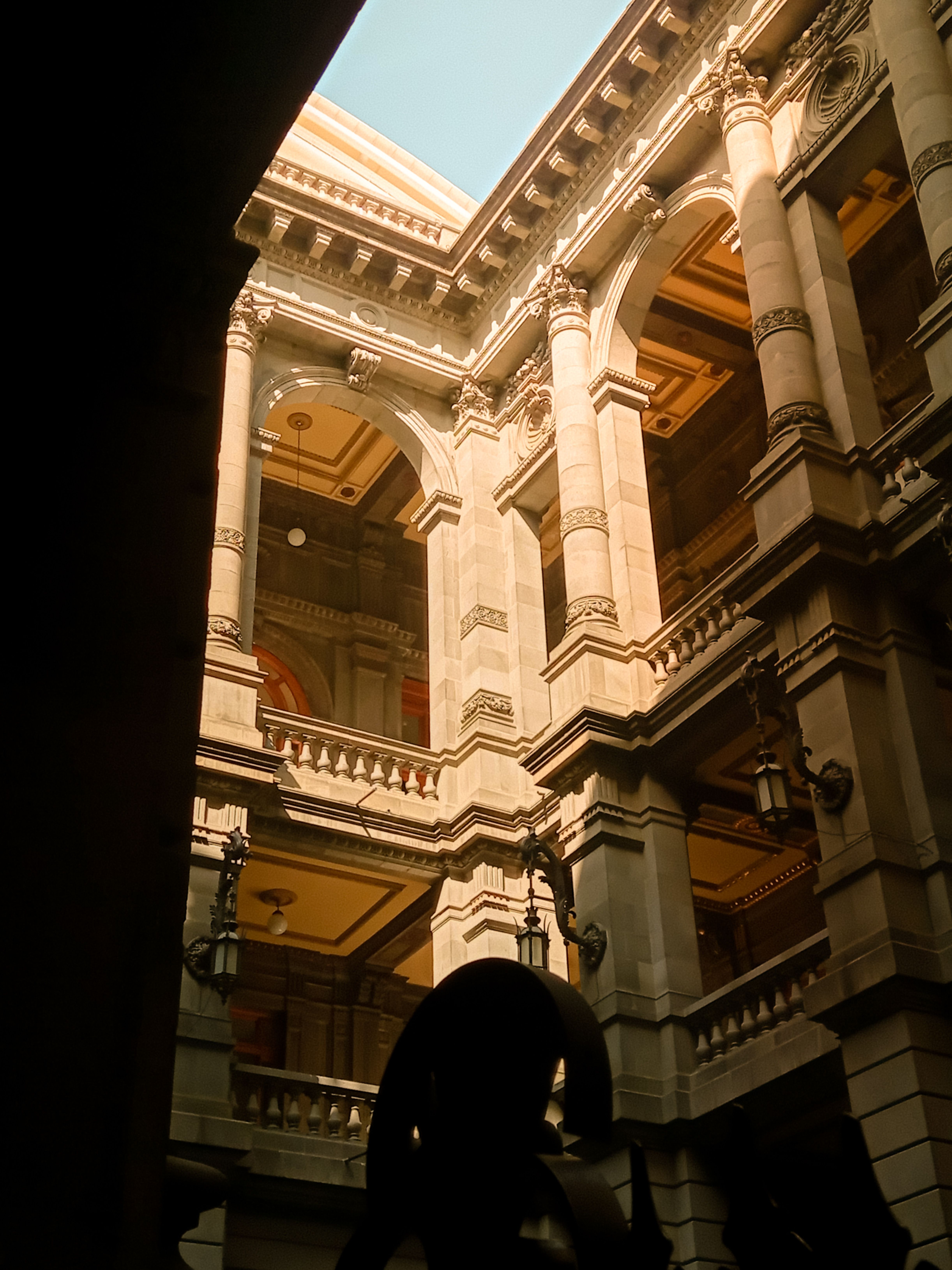 Arches and Columns in Building Corner · Free Stock Photo