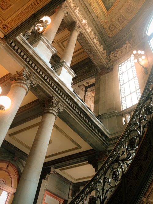 Free Stunning low-angle view of columns and ornate architecture in a historic Mexico City building. Stock Photo