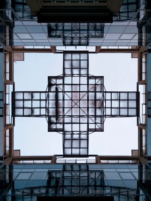 Free Discover the symmetrical modern architecture of Kyiv with this geometric rooftop perspective. Stock Photo