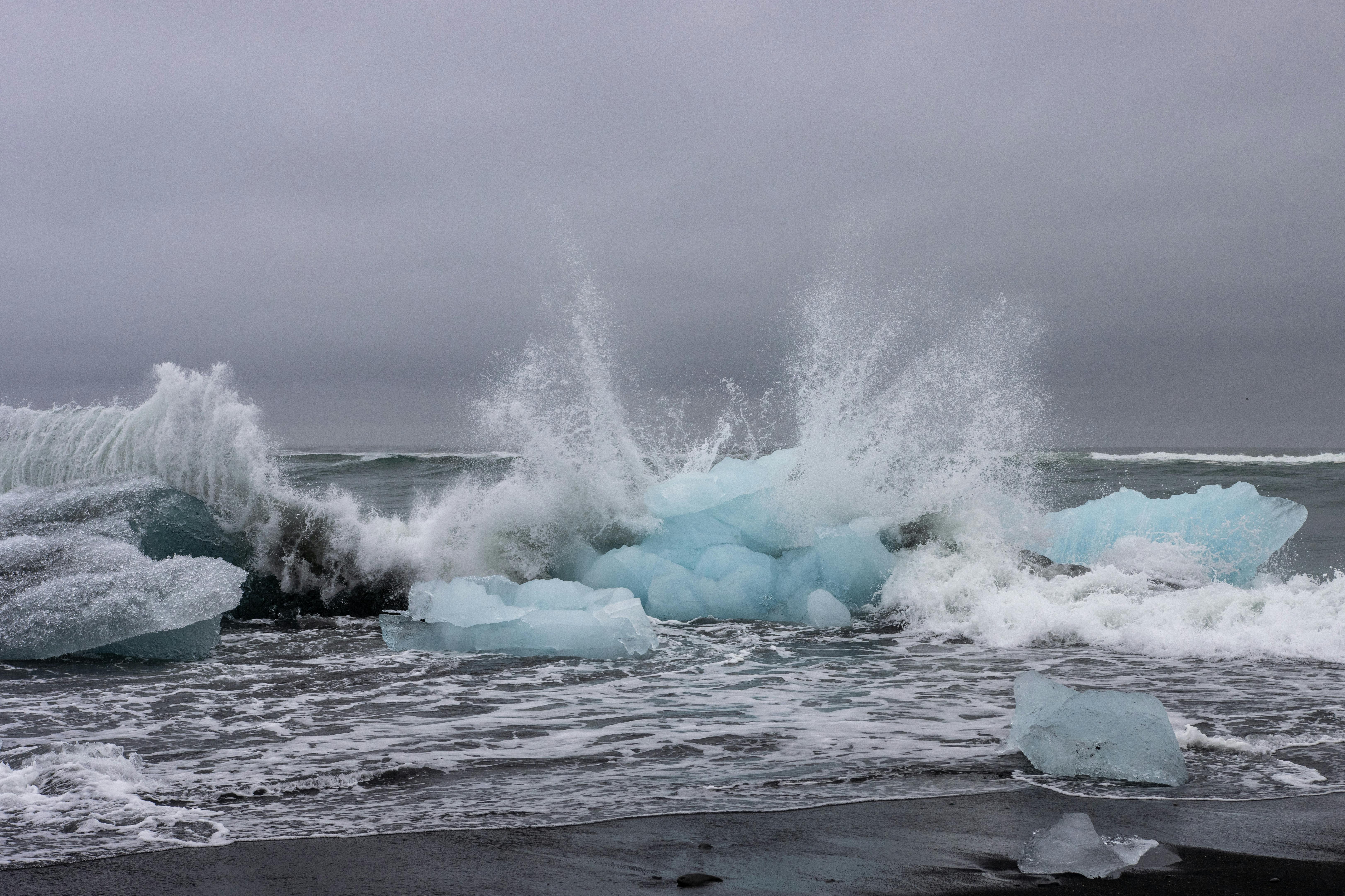 Outlet Ice Crashing into waves