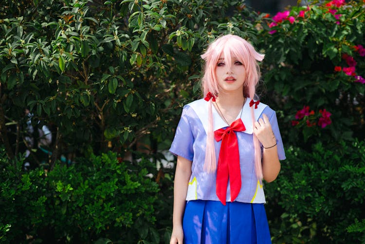 Girl Standing In A Park 