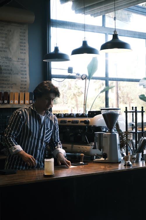 Man Behind a Bar Counter 