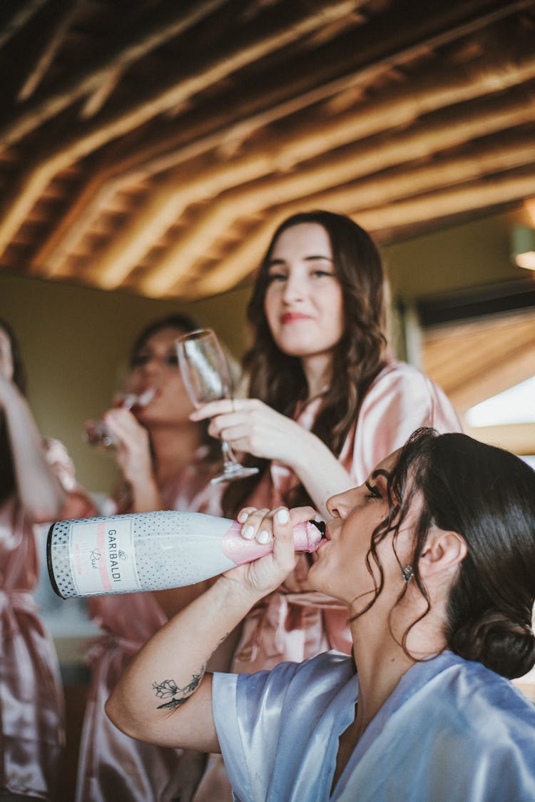 Women Having Fun At A Wedding 