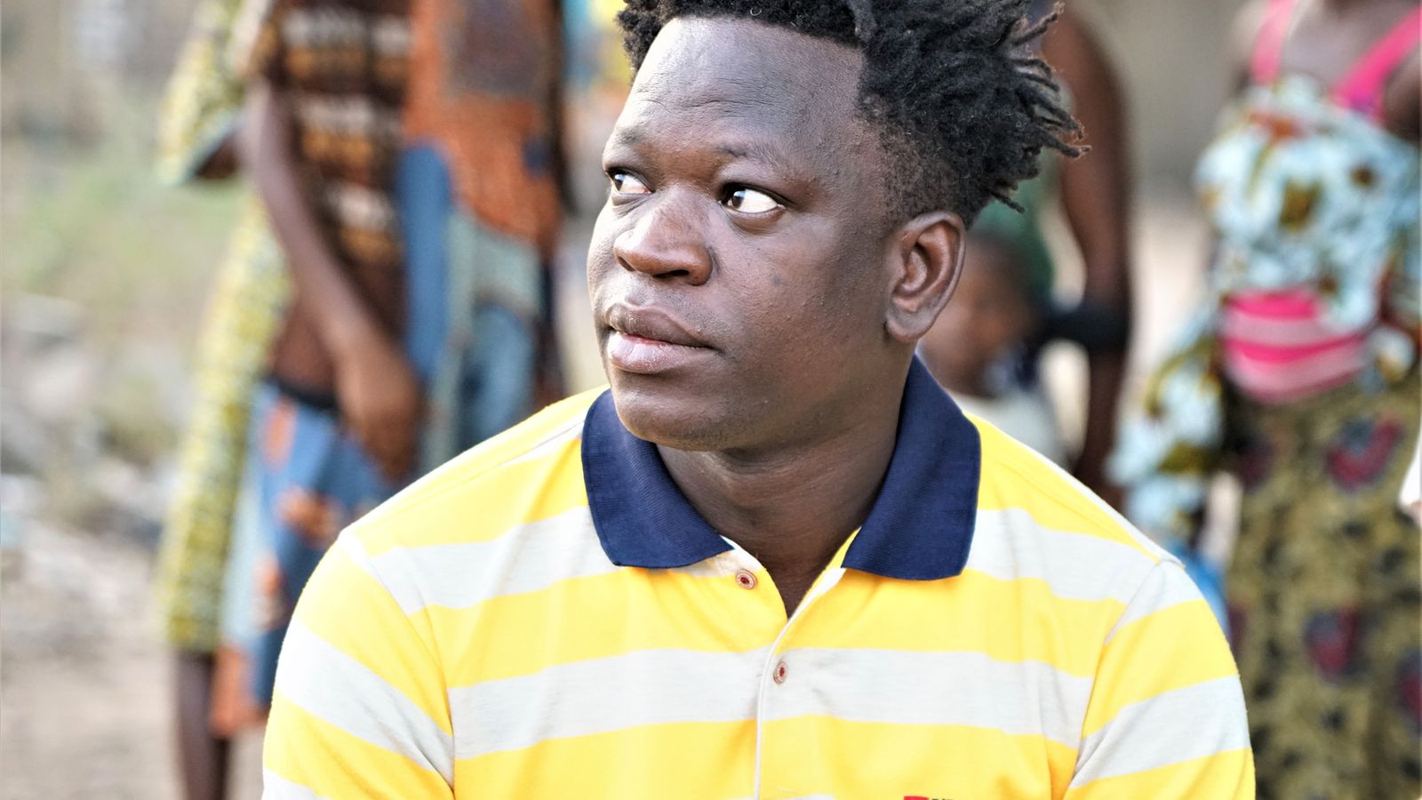 Portrait of man with short hair, Togo