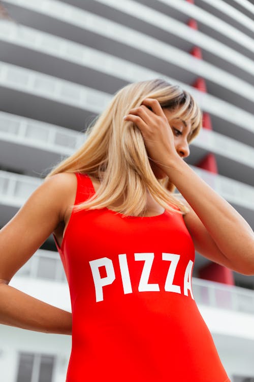 Blonde Woman in Red Clothes with Pizza Text