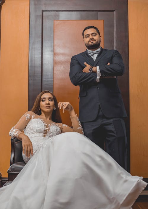 Newlyweds Sitting, Standing and Posing
