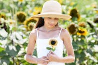 Woman in Sunflowers Field